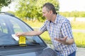 Man looking on parking ticket Royalty Free Stock Photo