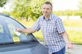 Man looking on parking ticket Royalty Free Stock Photo