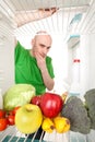 Man Looking into Refrigerator Royalty Free Stock Photo