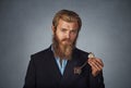 Man looking serious holding retro pocket watch Royalty Free Stock Photo
