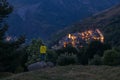 Man looking at the small village of Taull