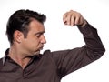 Man looking at sweat stain sweating perspiring Royalty Free Stock Photo