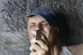 Man looking at timepiece Royalty Free Stock Photo