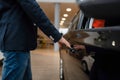 Man looking on transport interior, car dealership