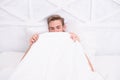 Man looking under blanket. Male reproductive system. Why men get morning erections. Normal erections occur. Guy relax in Royalty Free Stock Photo