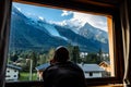 Man looking window Mont Blanc summit landscape view Chamonix