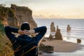 Man on lookout of Three Sisters, famous New Zealand place located in New Plymouth,Taranaki Region