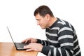 The man looks at the laptop screen Royalty Free Stock Photo