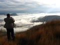 A man looks out over the cloud-covered Ithala Game Reserve