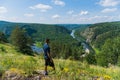 A man looks at the Panoramic view of Shulgan tash nature reserve, Bashkortostan, Russia. Aerial view