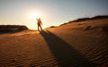 A man looks at the sun in the evening.