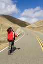 Man lost on a desolate road