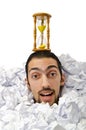 Man with lots of crumpled paper Royalty Free Stock Photo