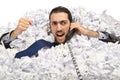 Man with lots of crumpled paper Royalty Free Stock Photo