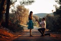 Man in love proposing a surprised,shocked woman to marry him.Proposal, engagement and wedding concept.Betrothal.Being affianced