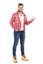 Man in lumberjack shirt pointing