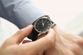 Man with luxury wrist watch on white background, closeup Royalty Free Stock Photo