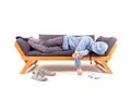 Man lying on couch with hangover. Royalty Free Stock Photo