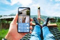 Man Lying In Hammock Watching CCTV Footage Royalty Free Stock Photo