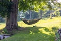 Man lying and resting in a hammock in nature Royalty Free Stock Photo