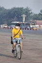 Man with 3M mouth cap on a bicycle, Beijing, china