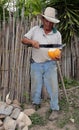 Man with Machete and Coconut
