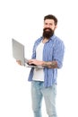 When man and machine become one. Happy computer man. Bearded man smiling with modern laptop. Brutal caucasian man in