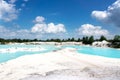 Man-made artificial lake Kaolin, turned from mining ground holes filled with rain water forming a clear blue lake, Belitung. Royalty Free Stock Photo