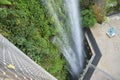 A man made artificial waterfall at Cloud Forest Gardens by the Bay Singapore