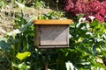 Man-made bee nests made of timber. Royalty Free Stock Photo