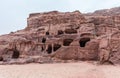 The man-made caves carved in red mountain in Petra - the capital of the Nabatean kingdom in Wadi Musa city in Jordan