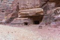 The man-made caves carved in red mountain in Petra - the capital of the Nabatean kingdom in Wadi Musa city in Jordan