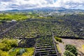 Man-made landscape of the Pico Island Vineyard Culture, Azores, Portugal. Pattern of spaced-out, long linear walls running inland Royalty Free Stock Photo