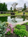 A man-made pool of water in the middle of a walking path Garden Royalty Free Stock Photo