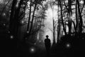 Man in magical forest with surreal lights Royalty Free Stock Photo