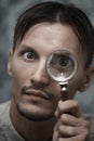 Man with magnifying glass Royalty Free Stock Photo