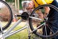Man maintaining his bicycle for the new season Royalty Free Stock Photo