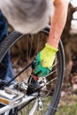 Man maintaining his bicycle for the new season Royalty Free Stock Photo