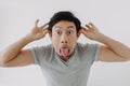 Man make funny teasing face for humor isolated on white. Royalty Free Stock Photo