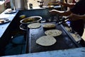Man making chapati. Indian street food stall