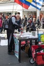 Man making a donation at the Free Palestine Rally