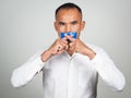 The man making finger on lips silence gesture, pst, shh Royalty Free Stock Photo