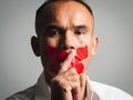 The man making finger on lips silence gesture, pst, shh Royalty Free Stock Photo