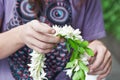 Man making flower wreaths Royalty Free Stock Photo