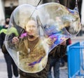 Man making giant soap bubbles Royalty Free Stock Photo