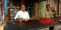 A man making indian traditional sweet pan with betel leaf spice  on pan shop Royalty Free Stock Photo