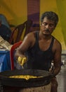 A man making jalebi