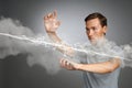 Man making magic effect - flash lightning. The concept of electricity, high energy. Royalty Free Stock Photo