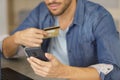 man making online purchase on smartphone Royalty Free Stock Photo