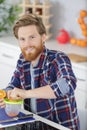 man making orange juice Royalty Free Stock Photo